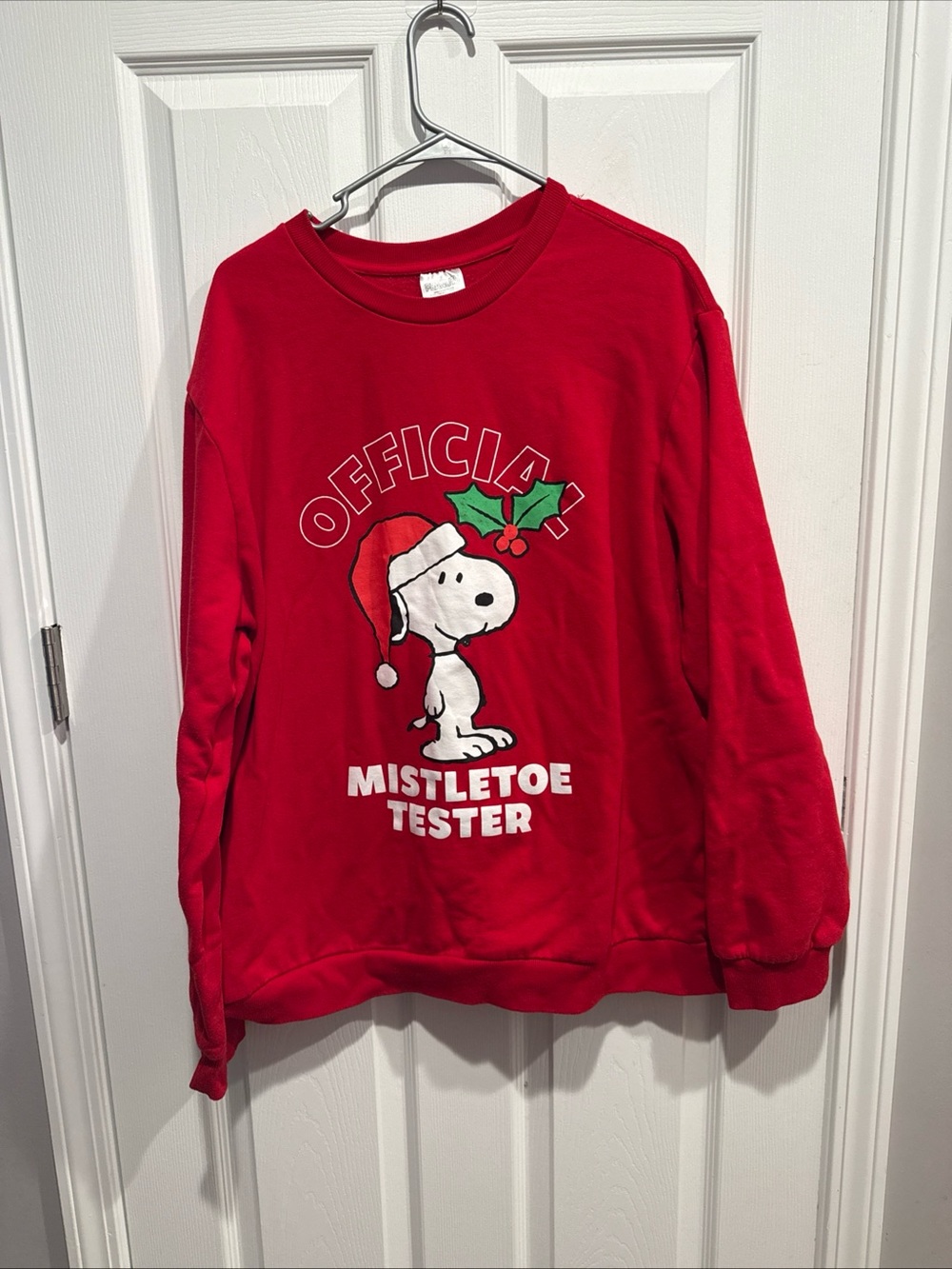 Peanuts Red Crewneck Sweater with Snoopy Mistletoe Graphic